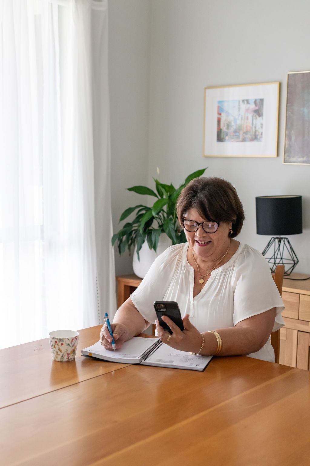 Kathleen Browne working at her desk